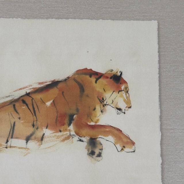 Anthropologie Pouncing Tiger 3 wall art by Wendover Art Group, featuring an expressive tiger in warm watercolor tones on...