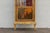 Beautiful antique French Louis XV-style curio cabinet / vitrine featuring elegant hand-carved details, gold leaf accents,...
