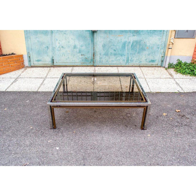 Table with steel and brass structure, glass top and colored acrylic glas details. Italian production 70's