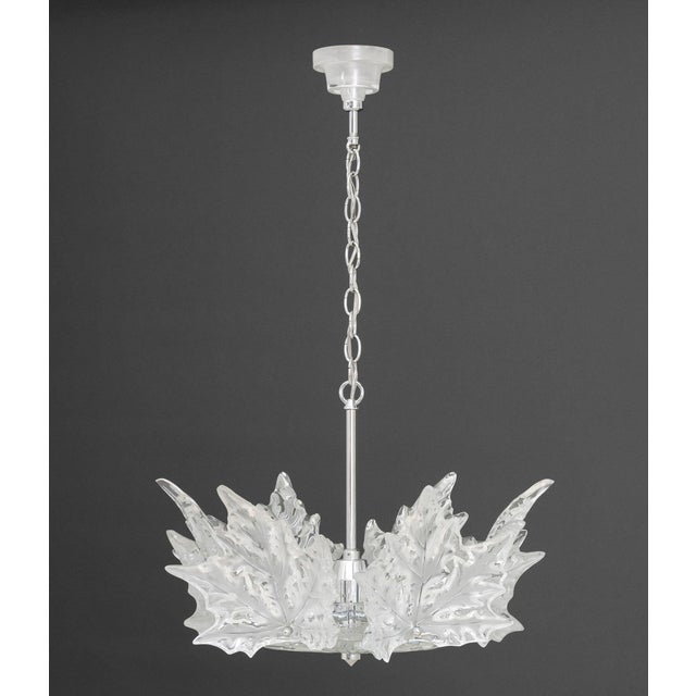 Lalique Champs-Elysees Chandelier, six-lights with molded clear and frosted leaf motif on chrome-plated hexagonal frame,...