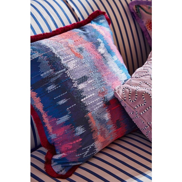 Raindrops drench the countryside creating a diffused vista awash with colour and texture. Bright floral pops transition...