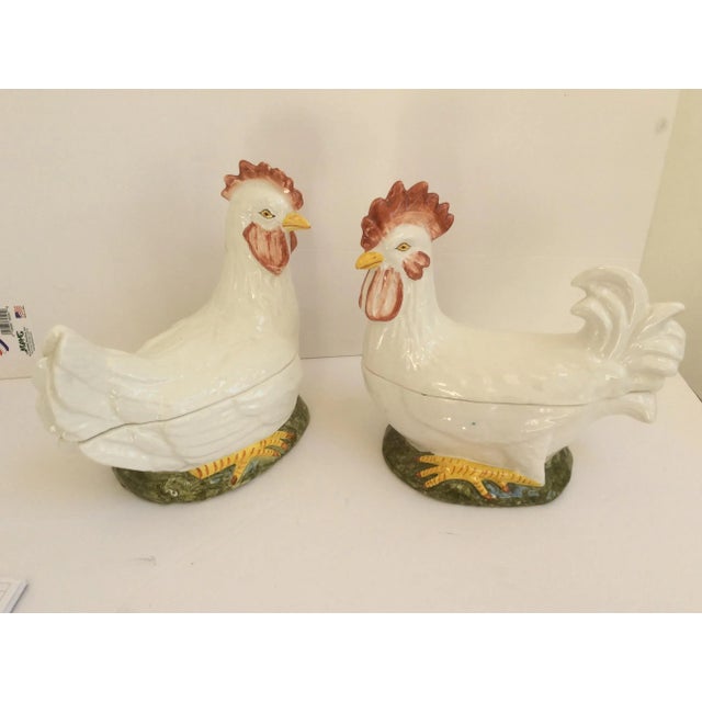 Pair of vintage covered chicken containers from Italy with minor ware on top of one chicken.
