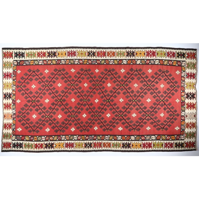 A very fine wool handwoven Sarkoy kilim,Circa 100 years old. it 's coming in good overal original condition. This...