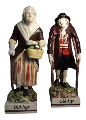 Early 19th Century Circa 1810 Staffordshire Pearlware Figures of Old Age - a Pair