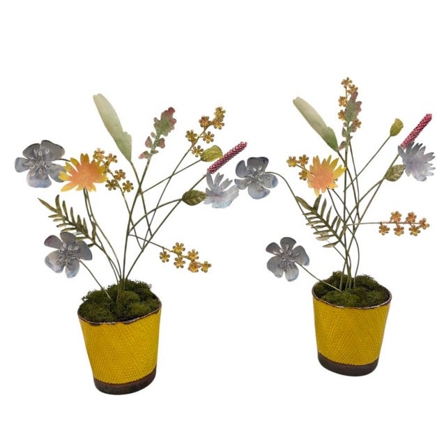 This delightful pair of vintage decorative floral arrangements brings a whimsical, artisanal touch to any interior space....