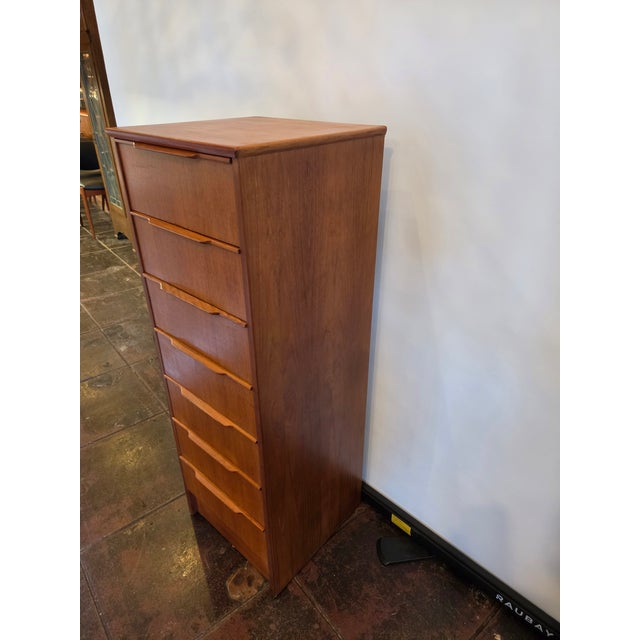 A very nice Austinsuite 1970s Loungerie Tall Dresser Teak. Teal wood Exterior and clean whitewood drawers.