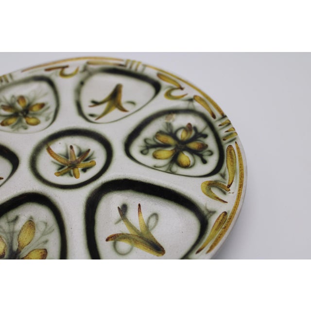 Sandstone Quimper Keralac Oyster Plate Hand painted. Rare find. 8.25" diameter. Good condition but has a firing...