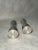 Set of two minimalist,contemporary design candle holders in heavy steel. This piece is attributed to the mentioned...