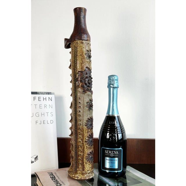 Fabulous 'neo-primitive' ceramic vase by the well listed artist Frank Colson! It has a great tactile hand feel and an...