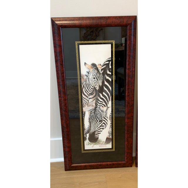 An exceptional, professionally framed African wildlife set featuring a zebra, an elephant with its calf, and a giraffe...