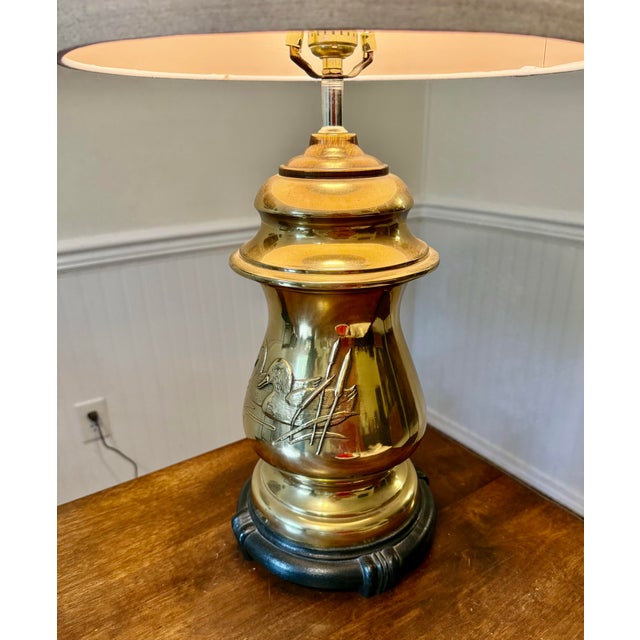 This vintage brass lamp is cherished for its timeless appeal and durability, frequently becoming a family heirloom. The...