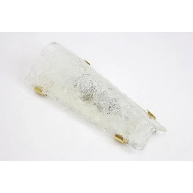 Gorgeous pair of angular glass sconces with brass holders by hillebrand leuchten, germany, circa 1960s. Each takes two x...