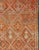 Measures: 5'7" X 8'4" Antique Moroccan Rug with Diamond & Geometric Design in Brown, red, Orange, Green This magnificent...