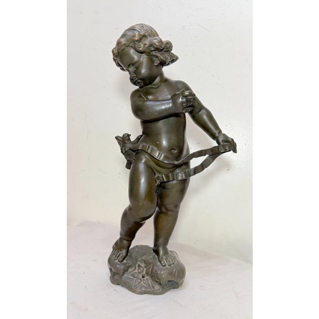 Up for sale is a large antique 19th century bronze statue of a nude putti, created by Italian artist Valentino Besarel....