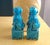 Here's a bright turquoise pair of bookends in the shape of Chinese foo dogs. Nicely detailed faces. Traditional design...