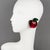 Whimsical oversized Lucite clip-on earrings designed by Harriet Bauknight for Kaso in the 1980s. They feature a...