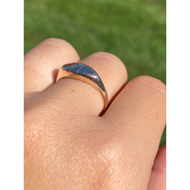 The Bundoora: Multicolor Gold Cocktail Ring. The ring features layered rose gold and white gold atop a yellow gold ring in...