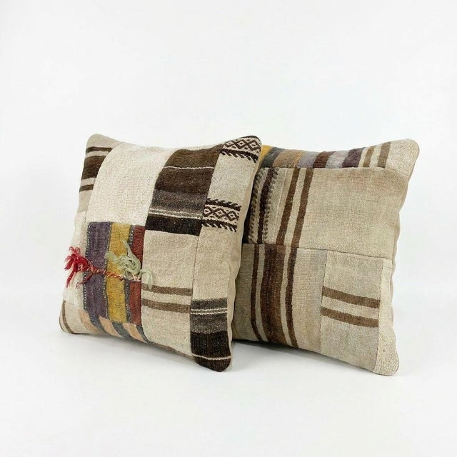 This beautiful 20'' X 20'' pillow cover set was made from authentic Turkish Kilim pieces. Bright colors of wool adorn the...