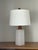 Wonderful minimalist table lamp in ceramic by famed ceramicist duo Jane and Gordon Martz for Marshall Studios. Features a...