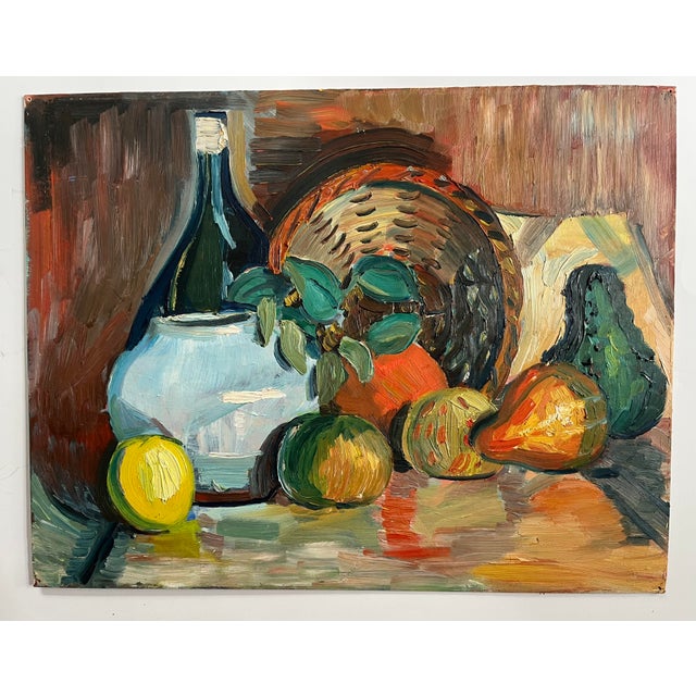 Bright, colorful, original oil painting on artist board, unsigned and unframed. It is a still life of an emptied basket of...