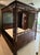 Fantastic hand carved, fretwork, chinoiserie canopy bed. Made of pecan wood with walnut veneers. Original owner purchased...
