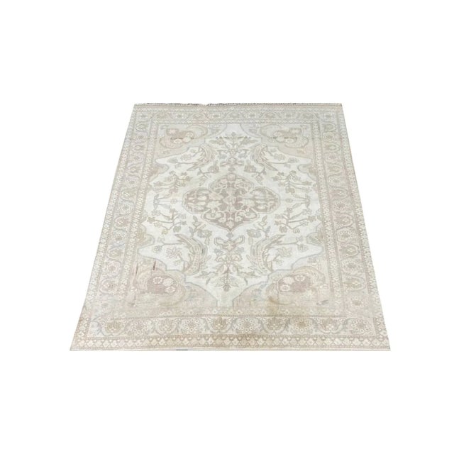 Exact Size: 4'1" x 5'5" Color: Natural Age: Old Materials: Wool Construction: Hand Knotted