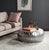 Inspired by the design legacy of architect Frank Gehry, this coffee table features a contemporary silver aluminum finish...
