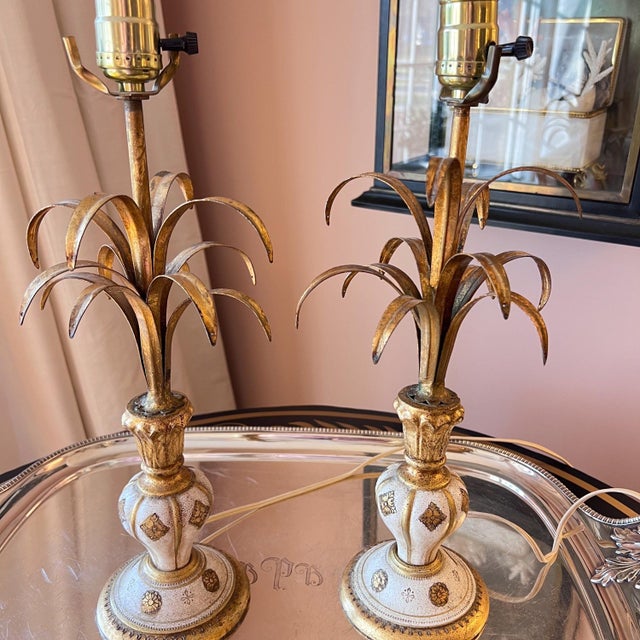 This is a gorgeous set of two Florentine carved giltwood lamps with gorgeous tole leaves. They. Are. Beautiful! They would...