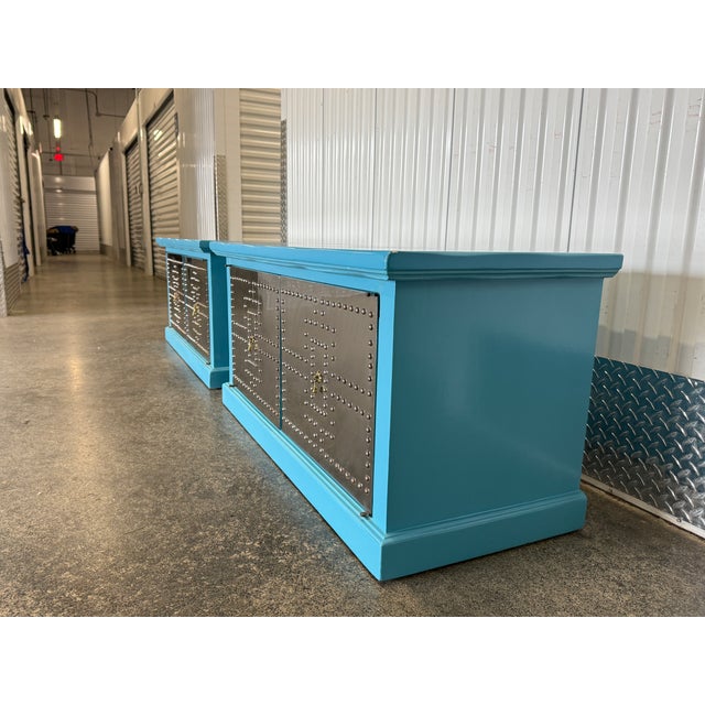 1970's Industrial Turquoise and Studded Metal Cabinets a Pair sold as found showing normal signs of previous use.
