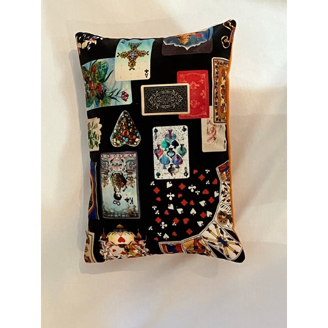 Brightly colored beautiful velvet pillows, sold as a pair. Fronts have their own unique design on a black background. The...