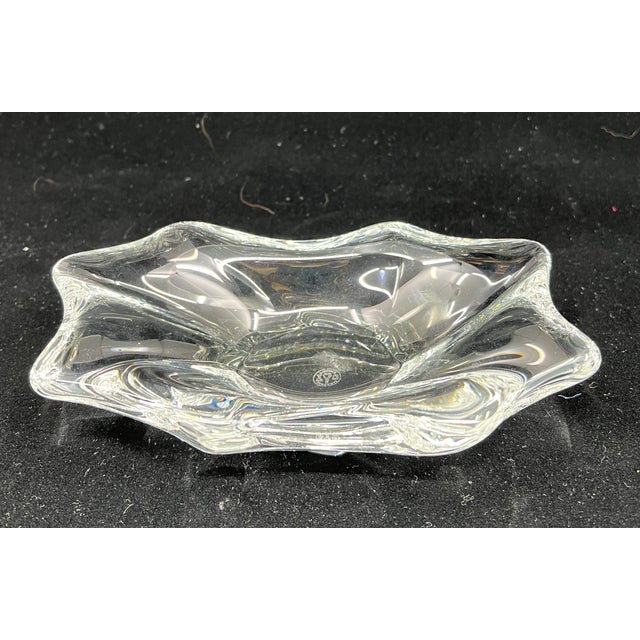 This is 1970's-80s Made In France Freeform Candy Dish. It looks like a splash. Signed on Side and bottom Baccarat, France...