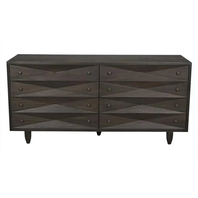 A straightforward walnut chest is elevated with the addition of multiple large diamond-shaped carvings. The elaborate...