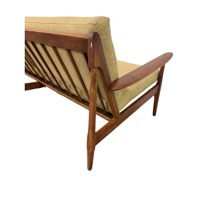 Elevate your living space with this stunning Mid-Century Modern walnut sofa and lounge chair set, beautifully restored to...