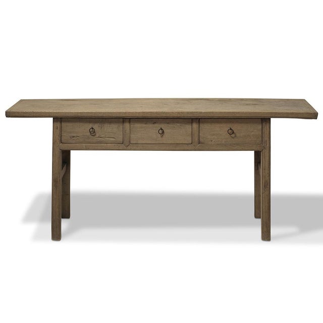 Handcrafted in the late 19th century in Shanxi province, this simplistic yet sturdy table is constructed from thick elm...