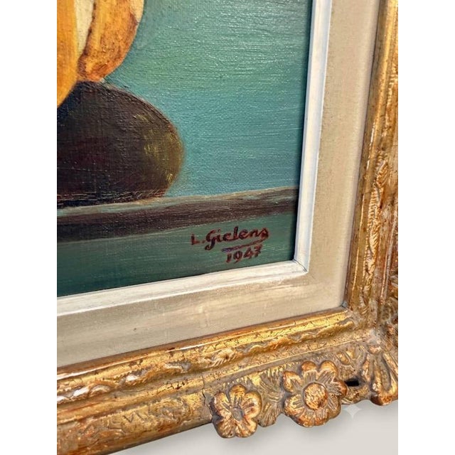 Housed in a magnificent, ornate gilt frame, this striking oil on canvas captures a timeless tabletop scene featuring a...