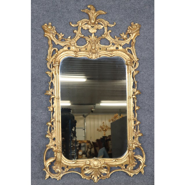 There are mirrors… and then there are mirrors that seem to remember Versailles. This magnificent carved giltwood mirror by...