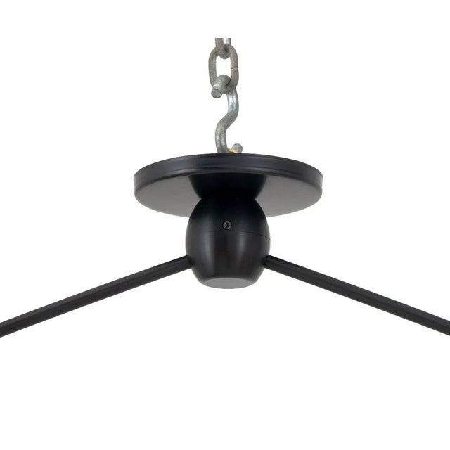 Jason Miller for Roll and Hill "Modo Linear" Pendant Lamp, the patinated black aluminum support with two white glass...