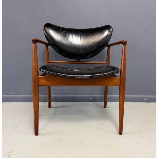 An iconic example of mid-century modern design, this Finn Juhl No. 48 open armchair dates to the 1950s and was...