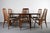 Beautiful 1950's Mid Century Modern Dining Table. Sits 6 comfortably! Stunning grain with the iconic pivot leg butterfly...