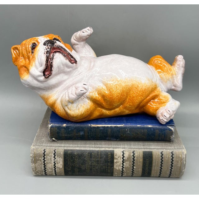 Charming English bulldog lying on his back and eagerly anticipating a belly rub. Made in the 1980's in Italy from thick...