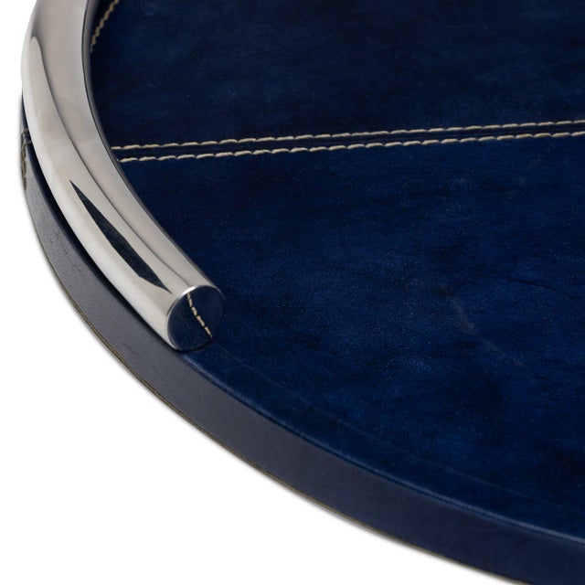 Genuine leather with contrast stitching and plated metal handles is refined luxury. Whether serving cocktails or breakfast...