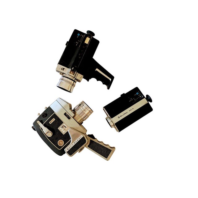 Vintage Set of 3 Super 8 Movie Cameras This is a vintage set of three Super 8 movie cameras by Bell & Howell, including:...