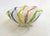 Tiny trinket dish from the 1960s. Round pedestal base, oval-shaped container with a wavy, corolla-shaped rim. Made...