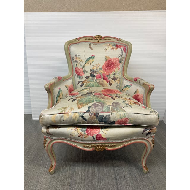 Design Plus Gallery presents a Bergere Chair with Gilt Accents + Floral with Aviary Upholstery. The chair is of a classic...
