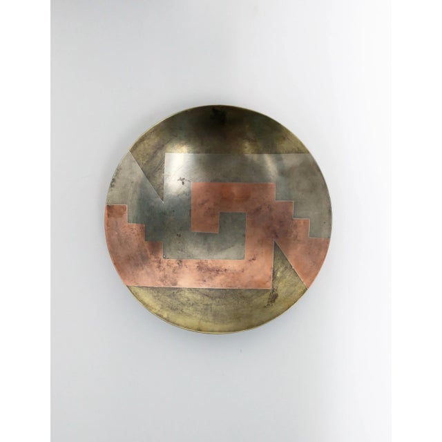 A beautiful modern mixed metals bowl with geometric design by designer E. Cabello, circa 1960s, Mexico. Great as a...