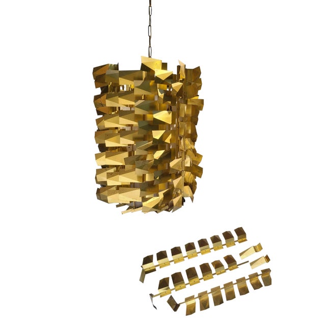 This chandelier was abandoned in a Midwest barn through many a winter. Designed by George Nelson for Howard Miller; it's...