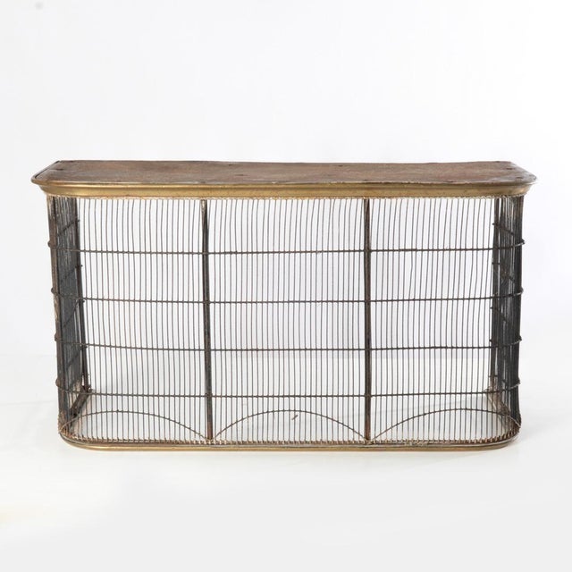 Federal Period wire and brass fire fender. Brings a traditional look to the room.