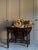 Beautiful vintage/antique-style wooden table with a rich, dark walnut-brown finish and lots of character. The table...