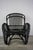 Set of Black Lacquered Rattan Lounge Chair with Ottoman, in Flawless conditions. Designed 1950 to 1959