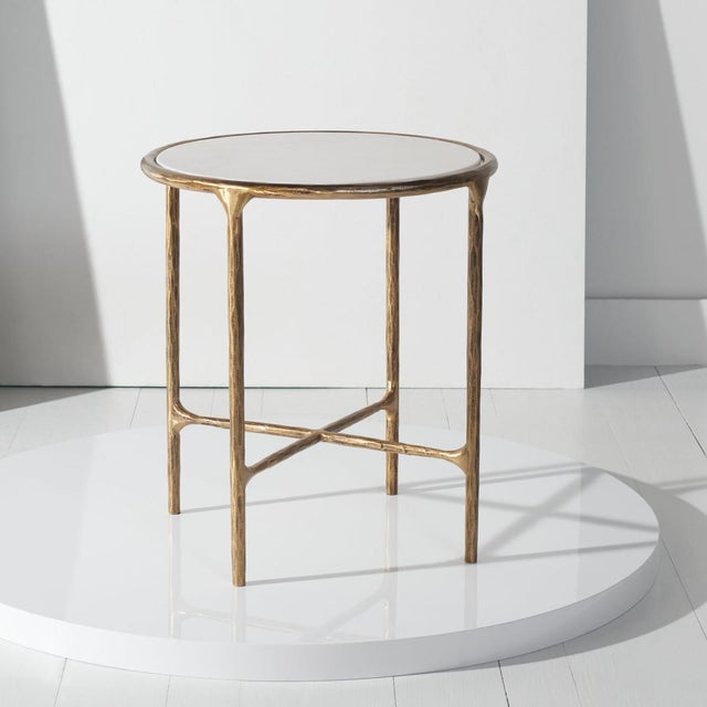 Introducing the JESSA forged metal round end table, a true embodiment of style and functionality. This exquisite piece...
